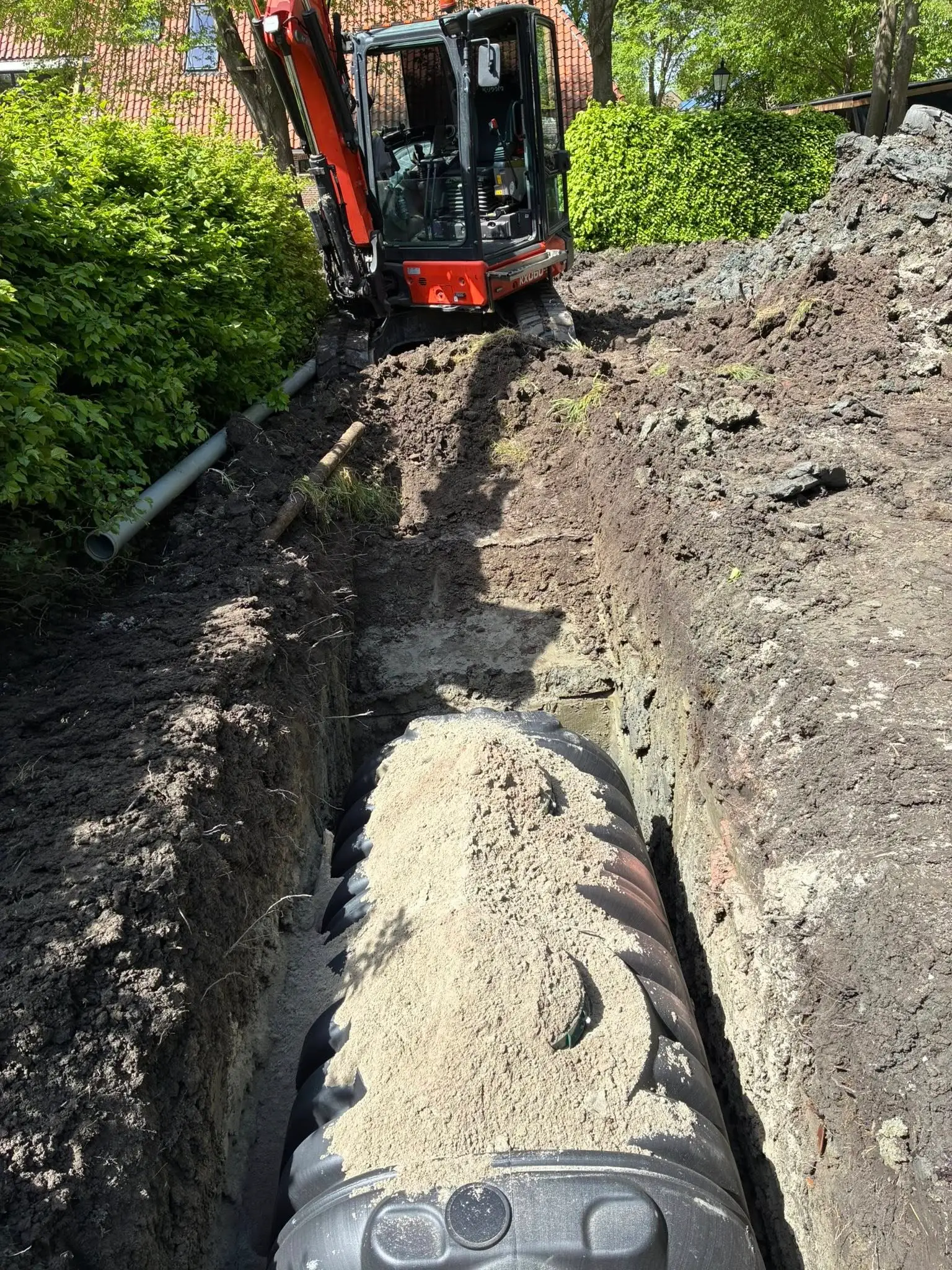 Grond afvoeren uit de tuin